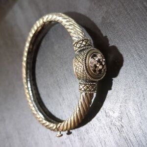 Silver Tone Twisted Cable Bangle Bracelet with Crystal Accent Centerpiece